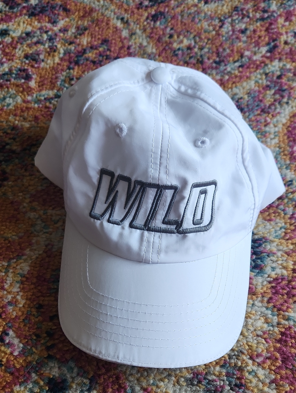 White Baseball Cap with WILD Embroidery